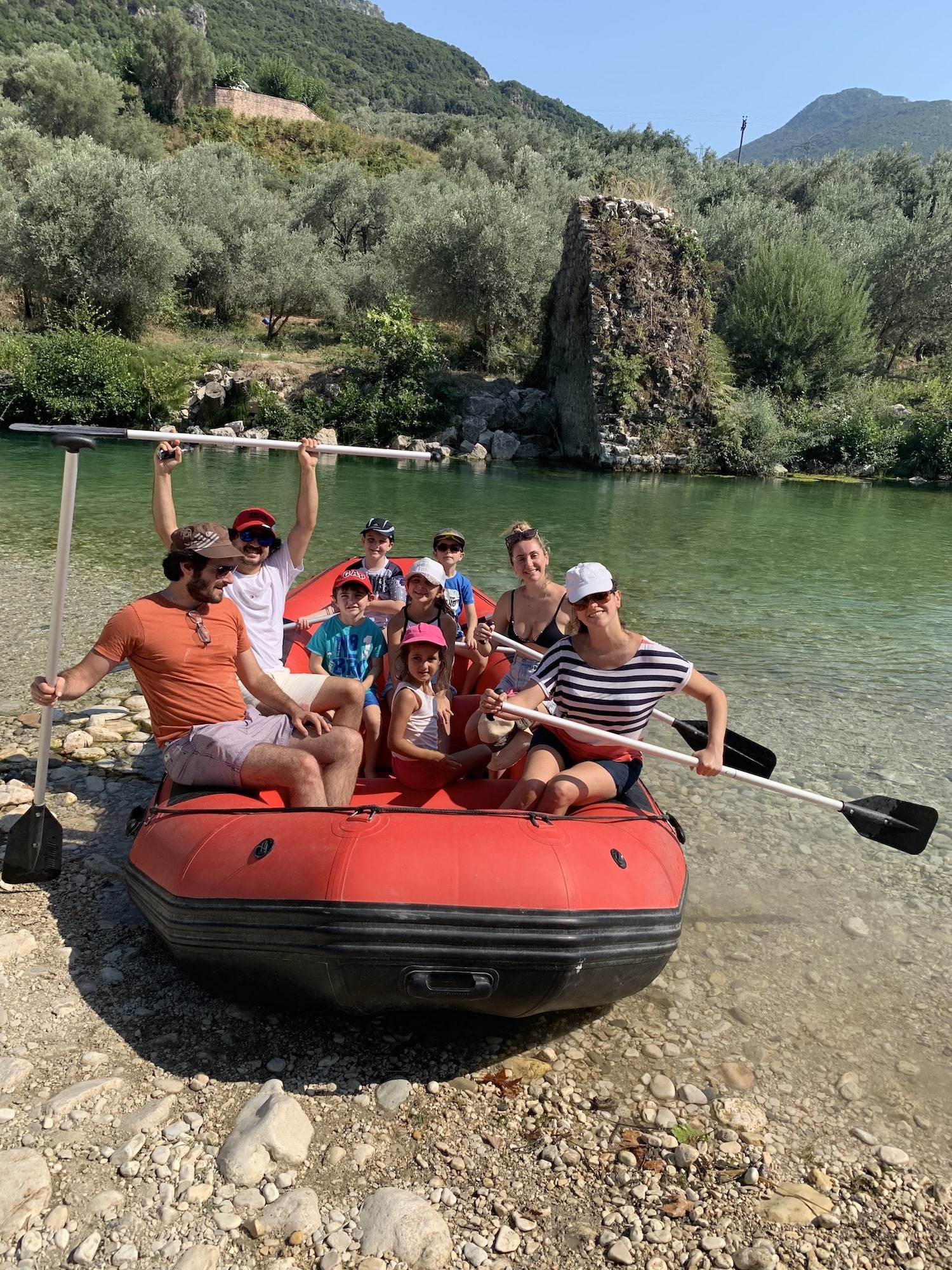 People sailing on Acheron River, one of the best day trips from Paleros