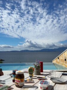 Breakfast at the infinity pool of Estia Ionian Villas in Paleros