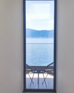 Window view during summer at Estia Ionian Villas in Paleros